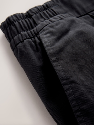 Next Slimfit Lærredsbukser i sort
