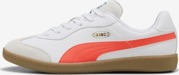 Chaussure de foot 'King 21' PUMA en blanc : devant