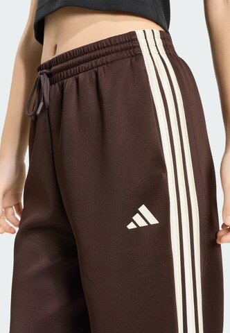 brūns ADIDAS SPORTSWEAR Vaļīgs piegriezums Sporta bikses 'Stadium'