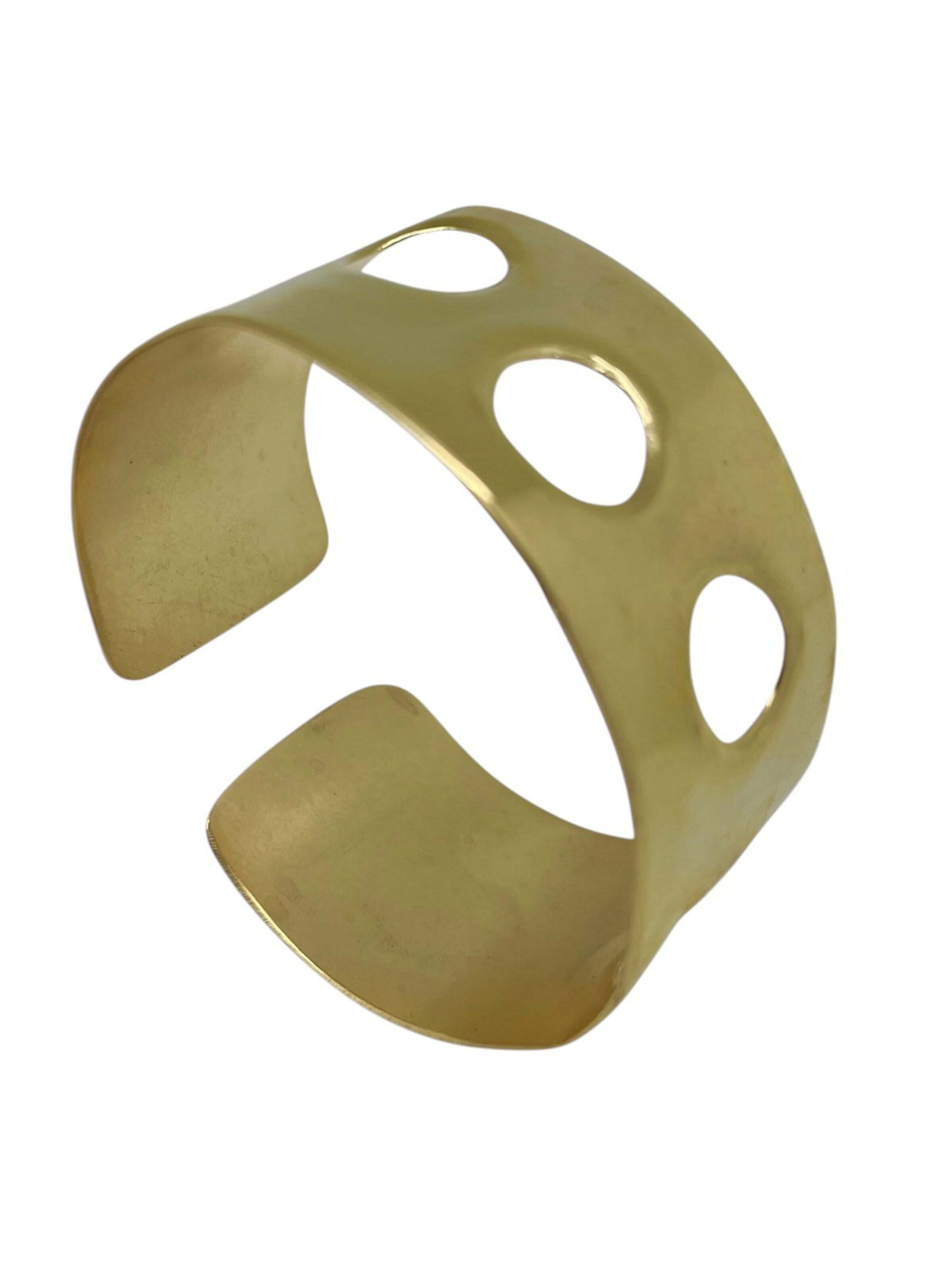 Gloria Mago Bracelet 'Wide brass bracelet with gold-plated hole by Gloria Mago design' in Gold: front