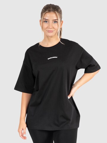 T-shirt oversize 'Benetta' Smilodox en noir : devant