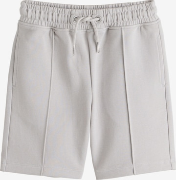 Next Nohavice - Sivá: predná strana