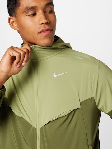 NIKE Sportovní bunda – zelená