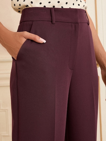 Wide leg Pantaloni con piega frontale di love & roses in rosso