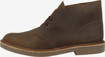 CLARKS Chukka Boots in Brown: front