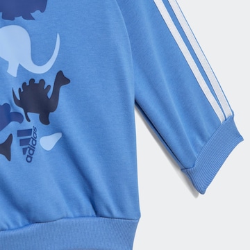 ADIDAS SPORTSWEAR Trainingsanzug 'Dino Camo' in Blau