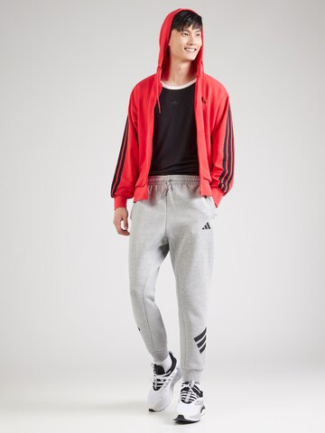 ADIDAS SPORTSWEAR Αθλητική ζακέτα φούτερ 'Essentials' σε κόκκινο