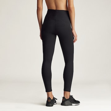 ADIDAS BY STELLA MCCARTNEY Skinny Sportnadrágok 'Yoga 7/8' - fekete