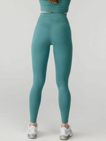 Skinny Pantalon ' COMPressive ' Girlfriend Collective en vert