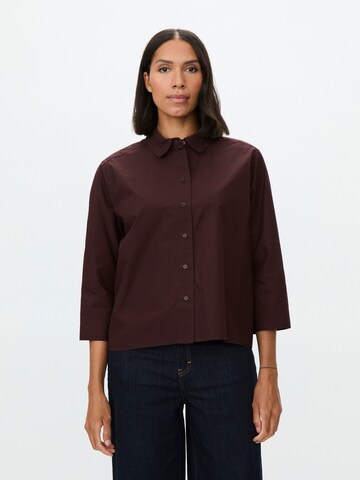 Masai Bluse i brun: forside