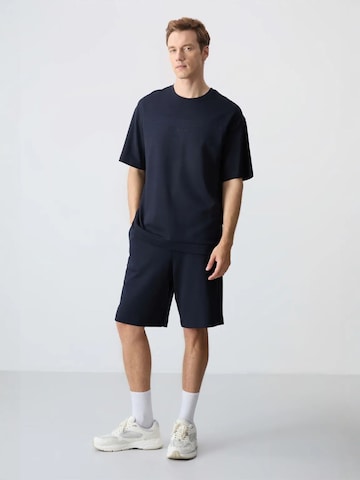 Survêtement Tommy Life en bleu : devant