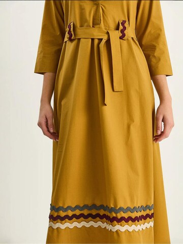 Bianco Lucci - Vestidos camiseiros em amarelo