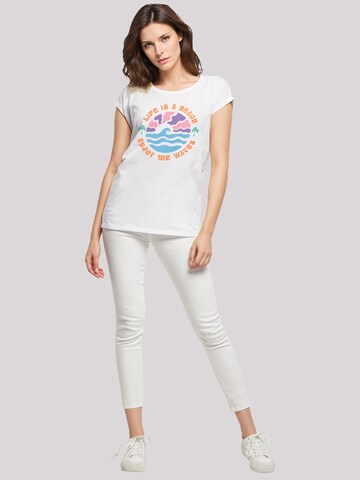 T-shirt 'Life Is A Beach Enjoy The Waves' F4NT4STIC en blanc