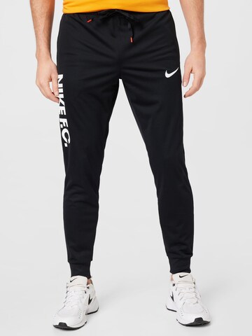 NIKE Tapered Workout Pants 'FC Libero' in Black: front