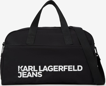 KARL LAGERFELD JEANS Viikonloppulaukku ' GYM ' värissä musta: etupuoli