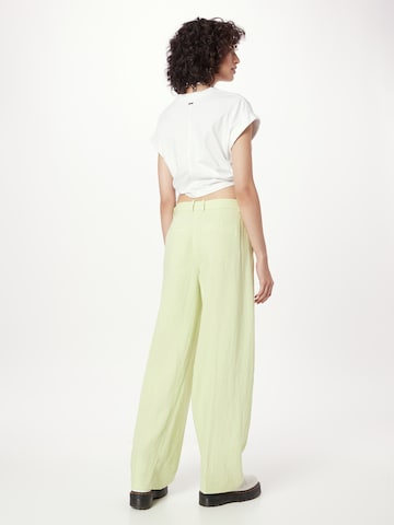 Wide leg Pantaloni con piega frontale 'DESK' di DRYKORN in giallo