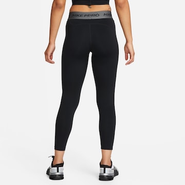 NIKESkinny Sportske hlače 'Pro Dri Fit' - crna boja