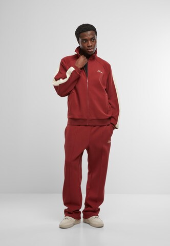 Veste de survêtement Karl Kani en rouge