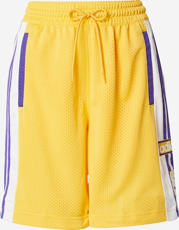 Loosefit Pantalon de sport ADIDAS ORIGINALS en jaune : devant