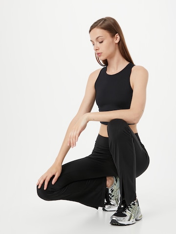 Girlfriend Collective Sports Top 'DYLAN' in Black