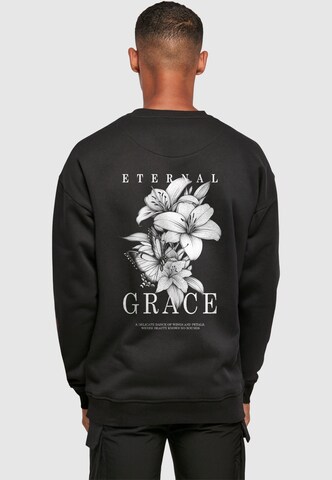 Merchcode Sweatshirt 'Eternal Grace' in Zwart: voorkant