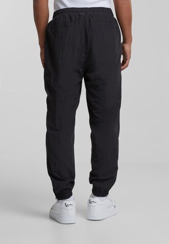 Effilé Pantalon de sport 'KM-PL074-001-01' Karl Kani en noir
