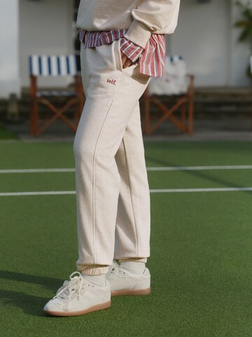 Tapered Pantaloni di self. in beige: frontale