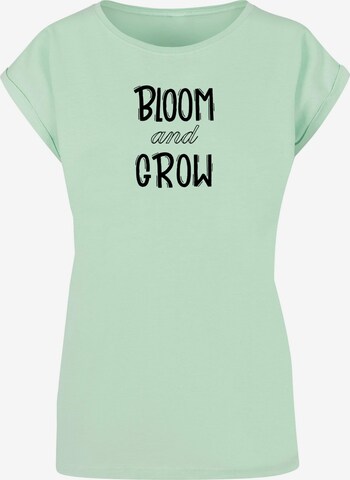 Merchcode T-Shirt 'Spring - Bloom And Grow' in Grün: predná strana