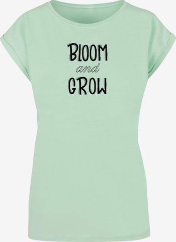 Merchcode T-Shirt 'Spring - Bloom And Grow' in Grün: predná strana