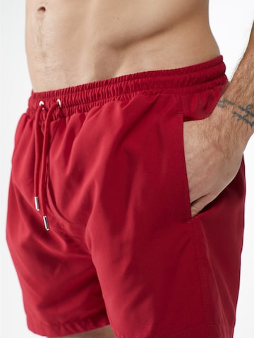 Pantaloncini da bagno 'MADDOX' di ABOUT YOU x Kevin Trapp in rosso