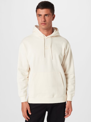 PUMA Sweatshirt 'Classics' in Beige: voorkant