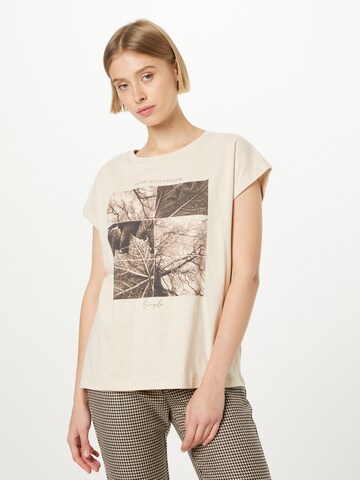 Cartoon T-Shirt in Beige: predná strana