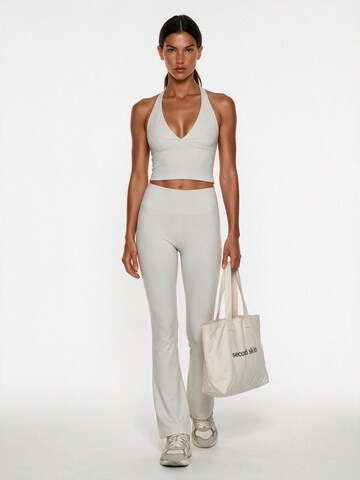 Top sportivo 'Second Skin Studio Halter Top' di GOD SAVE QUEENS in beige