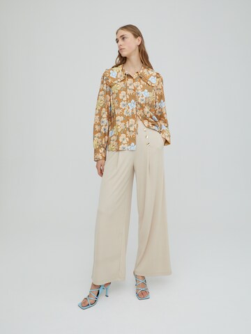 EDITED Wide Leg Housut 'Jamie' värissä beige