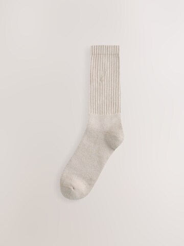Next Sukat värissä beige