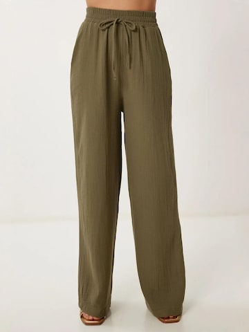 Happiness İstanbul Wide leg Broek in Groen: voorkant