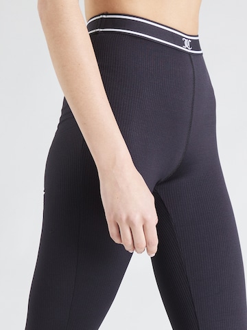 Skinny Pantaloni sport de la Juicy Couture Sport pe negru