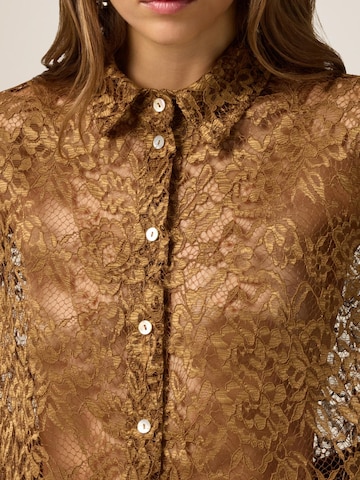 T-shirt oltre en marron