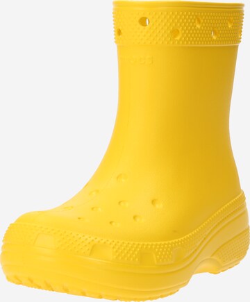 Bottes en caoutchouc Crocs en jaune : devant