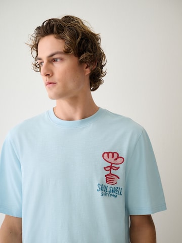 T-Shirt Next en bleu
