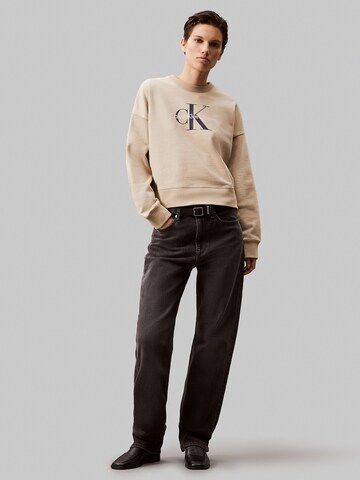 Calvin Klein JeansSweater majica - bež boja