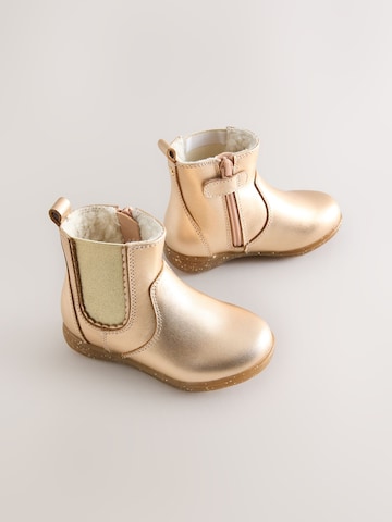 Next Stiefel in Gold