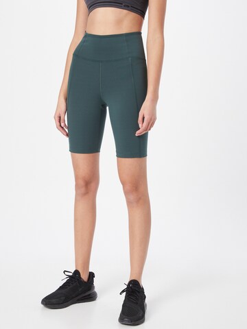 Girlfriend Collective Skinny Workout Pants in Green: front