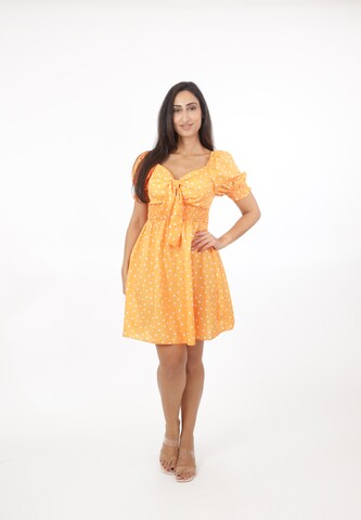 Elara Kjole i orange