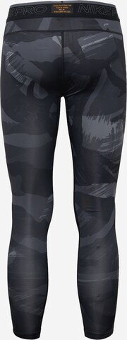 NIKE Skinny Sporthose in Schwarz