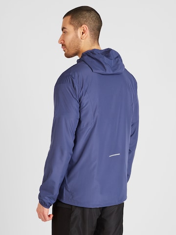 Veste de sport 'Accelerate' ASICS en bleu