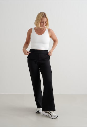 Bootcut Pantaloni sportivi 'Sense' di Aim'n in nero