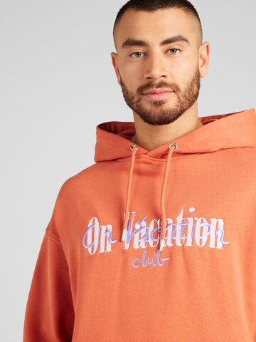 On Vacation Club Sweatshirt in Orange