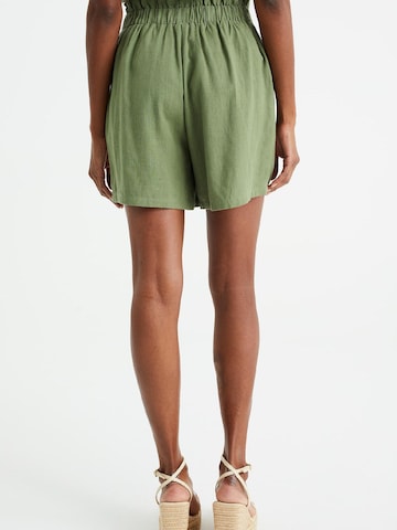 WE Fashion Loose fit Pleat-front trousers in Green