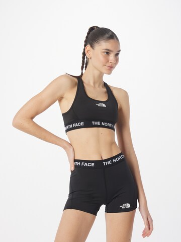 THE NORTH FACE Bustier Sport-BH in Schwarz: predná strana